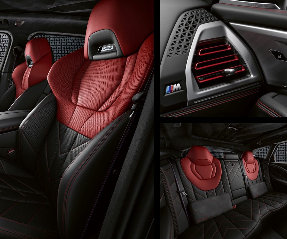 Detail of front seats, clad in exclusive BMW Individual Fiona Red & Black Merino Leather with exclusive M Signature Trim and red stitching and accents. Detail of red accented vent. Detail of rear M Lounge with exclusive XM pillows in BMW of Dayton | Dayton OH